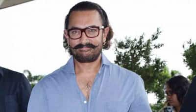 Aamir Khan spotted reading Mahabharata at airport. Is Rs 1000 cr project on the cards?