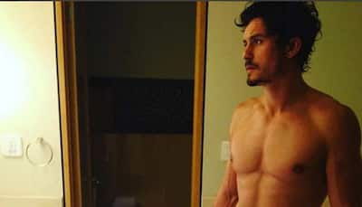 Orlando Bloom strips down in bathroom video as he escapes gigantic spider
