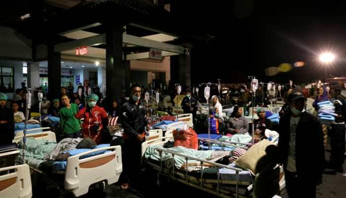 Mass tourist exodus after massive quake rattles Indonesian island, jolts tourism