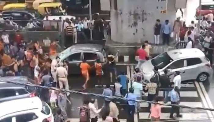 Watch: 'Kanwariyas' create ruckus, damage vehicle on Delhi street Watch: 'Kanwariyas' create ruckus, damage vehicle on Delhi street