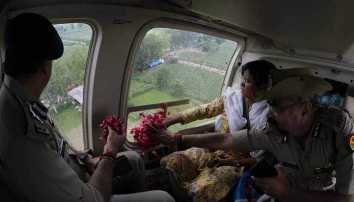 UP top cop showers rose petals on Kanwariyas from helicopter – WATCH