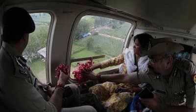 UP top cop showers rose petals on Kanwariyas from helicopter – WATCH