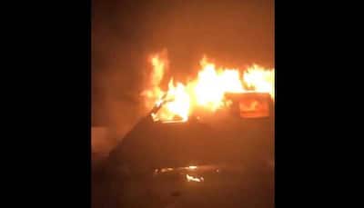 Man burnt to death as car catches fire in Delhi's Ambedkar Nagar - Watch