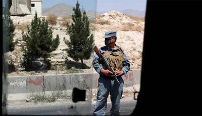 At least 100 security personnel, 30 civilians killed in fight for Afghan city