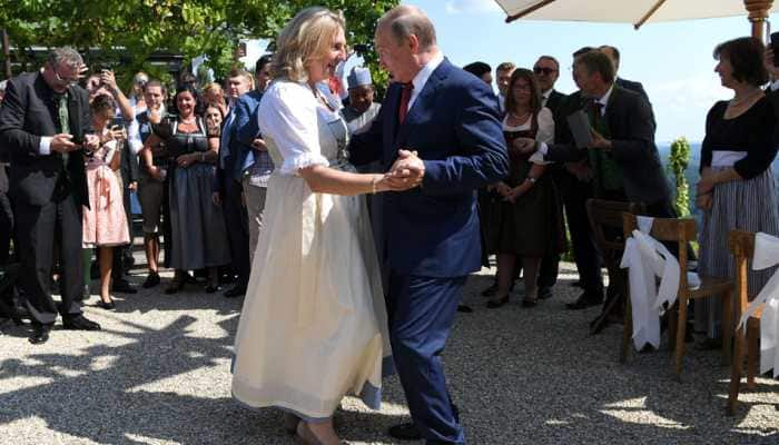First a wedding, then hard work: Putin to visit Germany&#039;s Merkel