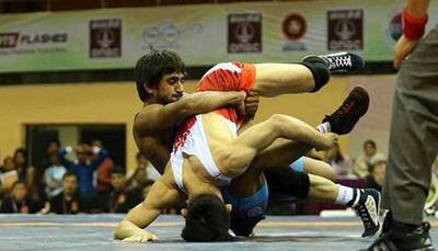 Bajrang Punia wins gold for India, beats Japan's Daichi Takatani 11-8 in men's freestyle wrestling 65 kg