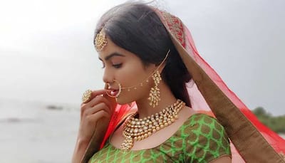 Adah Sharma stuns as a bride in these BTS pics from a photoshoot 