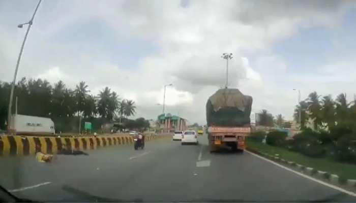 Miraculous escape caught on camera: Couple falls off; bike continues for 300 metres with kid