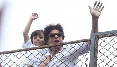 Shah Rukh Khan-AbRam wave at an ocean of fans outside Mannat on Eid—Watch