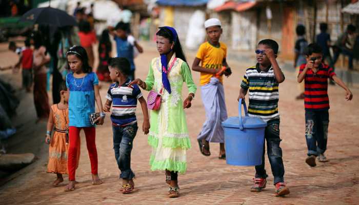 A year on, Rohingya still fleeing Myanmar for crowded camps