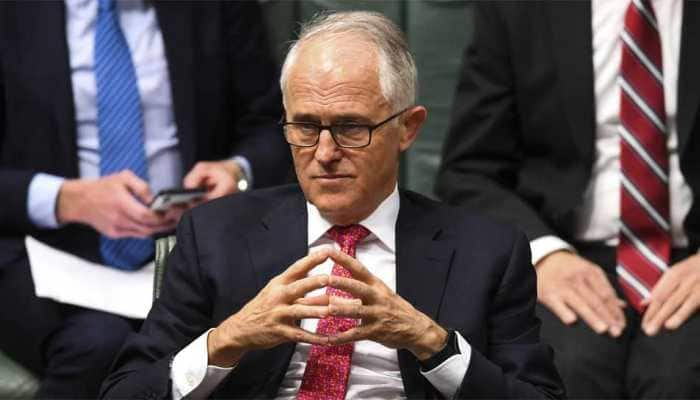 Australian PM Malcolm Turnbull stubbornly clings to power even as ministers desert him