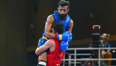 Asian Games 2018: Iran’s Wushu player Erfan Ahangarian wins millions of hearts by helping injured Indian rival Surya Bhanu Pratap Singh