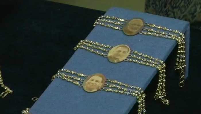 Jewellery shop in Surat offers gold rakhis with PM Modi, Yogi Adityanath portraits
