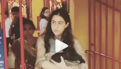 Sara Ali Khan tells photographer not to click pics as she makes donations outside a temple - Watch