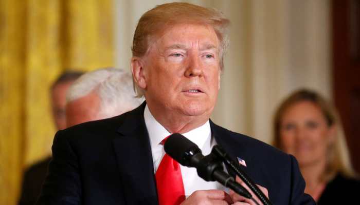 Trump praises John McCain after dodging questions about him