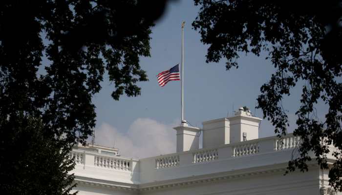 White House wobbles on US flag after McCain death