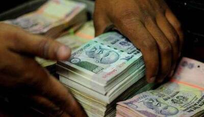 Rupee rises 10 paise against US dollar