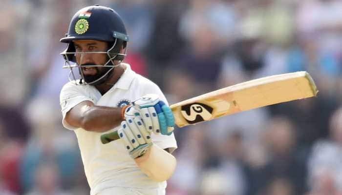 Pujara&#039;s ton helps India take slender lead against England