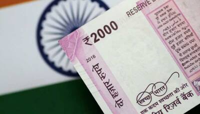 Rupee plunges to yet another record low of 71.10 vs dollar