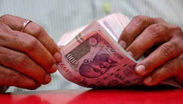 Rupee hits fresh record low, touches 71.27 against US dollar