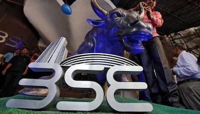 Sensex ends lower for second day, rupee continues to slide