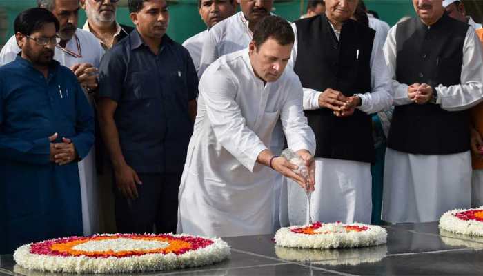 Rahul Gandhi offers holy water from Kailash Mansarovar at Mahatma Gandhi&#039;s samadhi