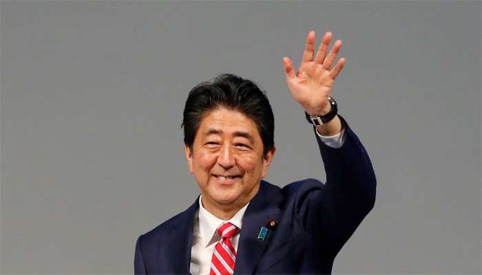 Japanese Prime Minister Shinzo Abe says arranging visit to China next month