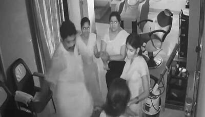 Watch: Former DMK Corporator repeated kicks woman at salon; arrested