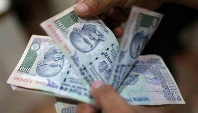Rupee ends slightly higher at 71.85 against dollar