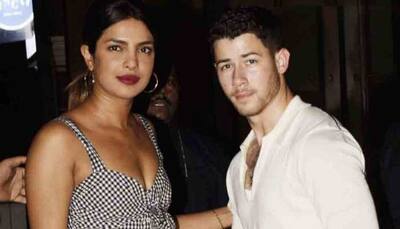Priyanka Chopra, Nick Jonas indulge in some PDA, steal a kiss — Watch