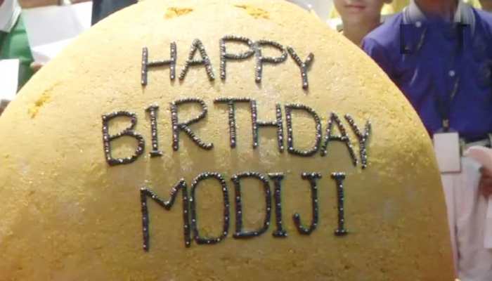 Javadekar, Naqvi celebrate PM Modi’s birthday by cutting giant 568 kg Laddu