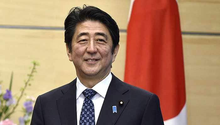 Japan's Shinzo Abe re-elected as LDP chief, on track for extended term