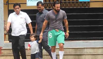 Saif Ali Khan heads out for a stroll outside his residence with son Taimur — Pics inside