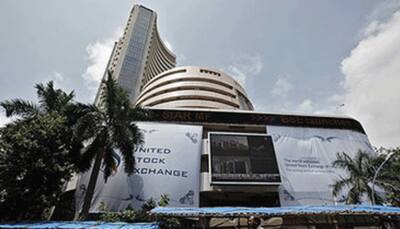 Sensex sheds over 200 points, Nifty closes below 11,000