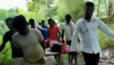 Odisha: Locals carry patient on cot due to lack of proper roads