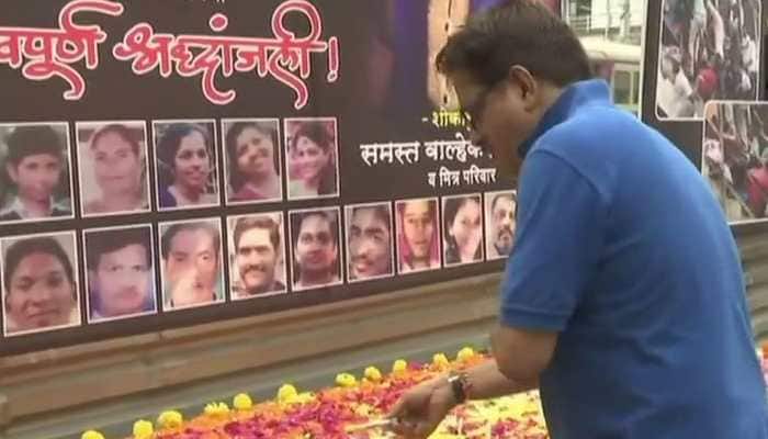 Mumbai: People pay tribute to victims on first anniversary of Elphinstone stampede
