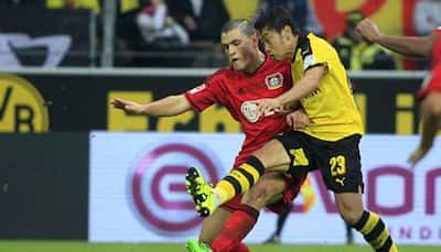 Football: Borussia Dortmund stage late comeback win to go top of the Bundesliga