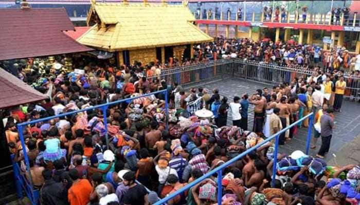 Hundreds of Ayyappa devotees block roads against SC verdict on Sabarimala, woman tries to immolate self