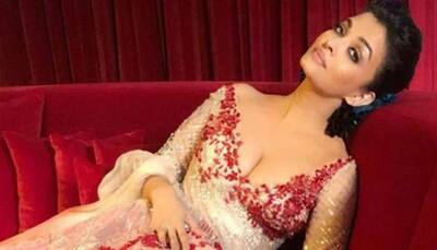 Aishwarya Rai Bachchan looks stunning in a shimmering red gown at Manish Malhotra's Doha fashion show—Pics