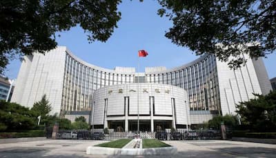 China pumps USD 109 billion into economy as trade war bites on growth