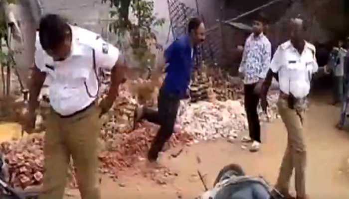 Watch: Drunk man arrested for thrashing cops in Karnataka's Davangere