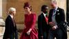Holding their hats, guests arrive for 2018's second big UK royal wedding