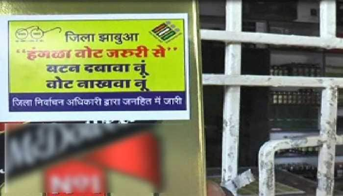 In MP&#039;s Jhabhua, officials use stickers on liquor bottles for voter awareness, later roll back plan