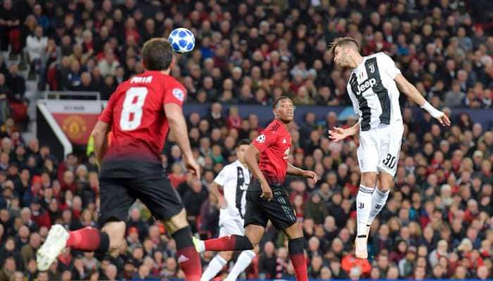 Juventus take charge of Group H with win at Manchester United