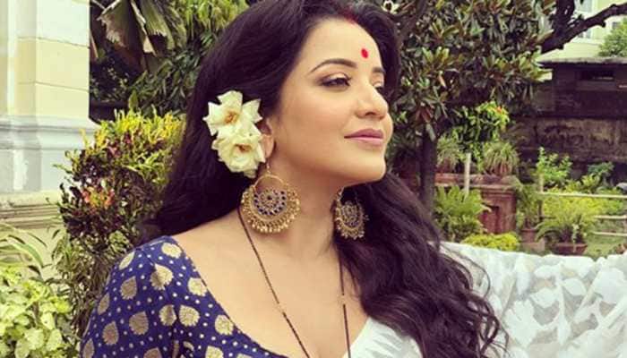 Monalisa sizzles in sheer white saree, enjoys being a &#039;water baby&#039; - See pics
