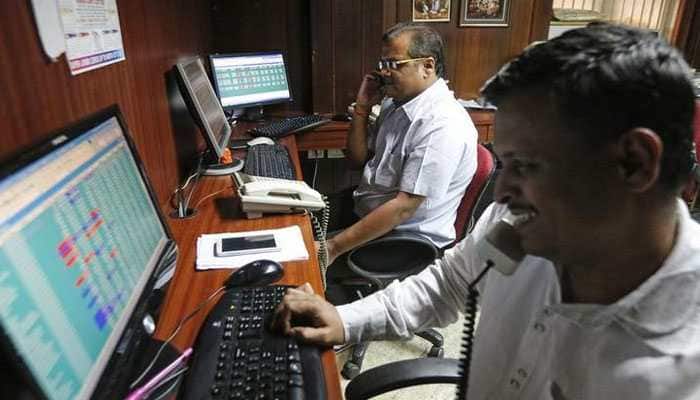 Sensex reclaims 34,000 despite rupee nearing 74