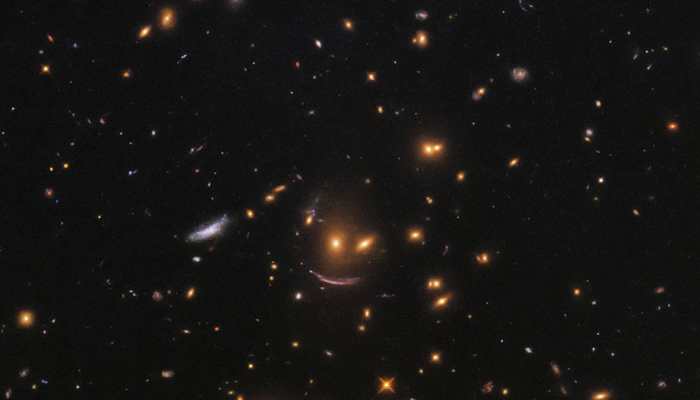 NASA&#039;s Hubble telescope finds smiling face among colourful galaxies