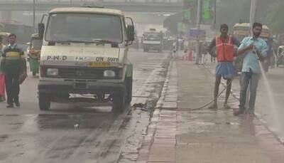 Delhi: Water sprinkled in several areas to check pollution