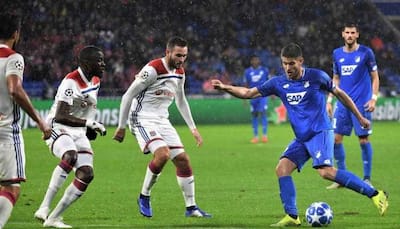 Late goals earn 10-man Hoffenheim 2-2 draw at Lyon