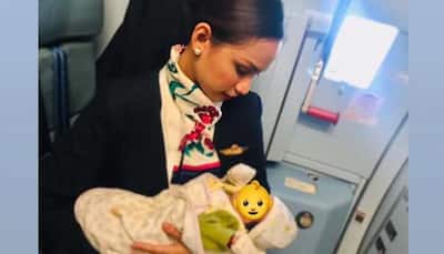 Flight attendant breastfed crying baby after mother runs out of milk mid-air